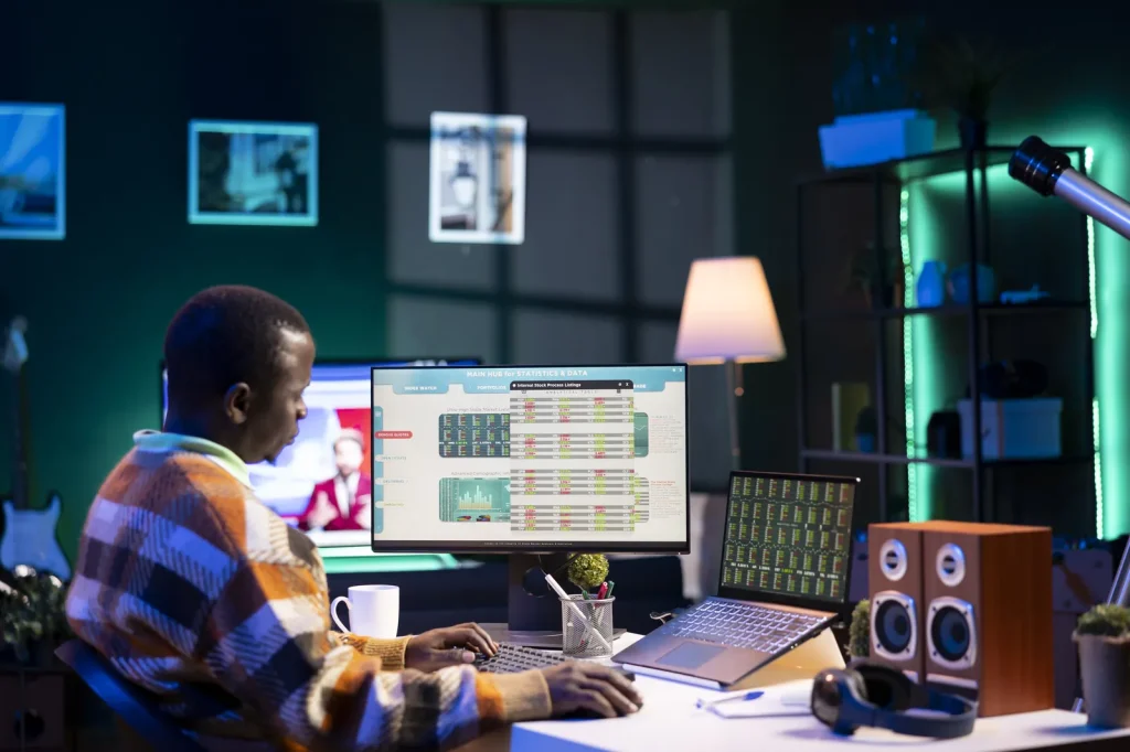 Solo Agency Delivers Agency-Scale Reporting (man working alone at his laptop setup)